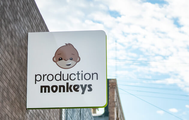 Production Monkeys logo on exterior signage