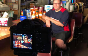 Man being interviewed for video commercial